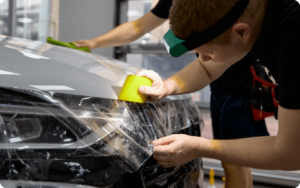 Luminous installer applying Luminous paint protection film (PPF) - Luminous Academy